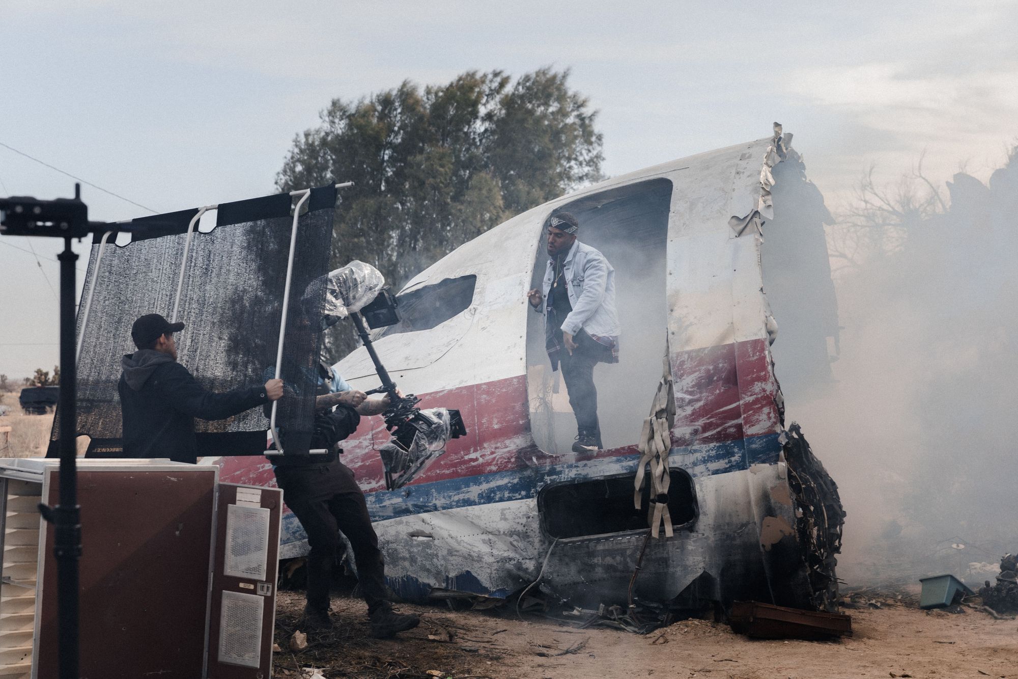 Creative music video shoot on a broken airplane