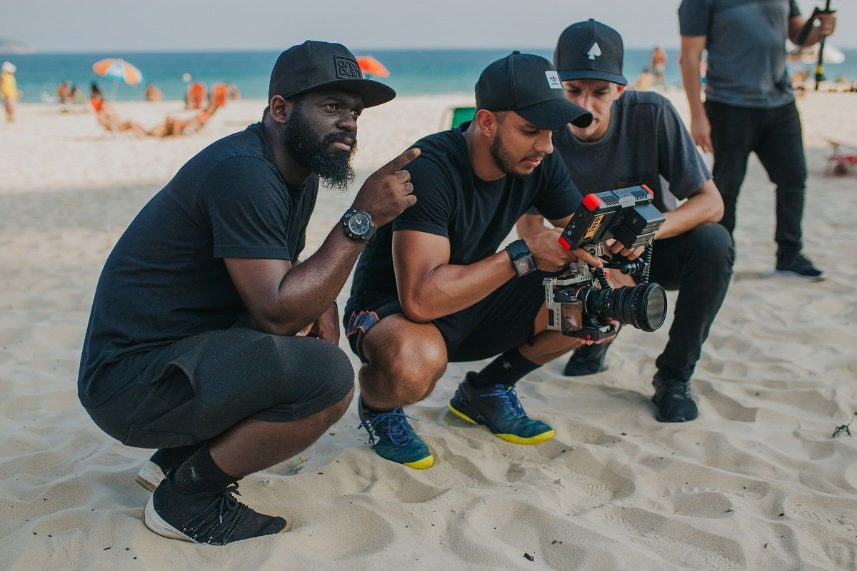 film directors on a beach