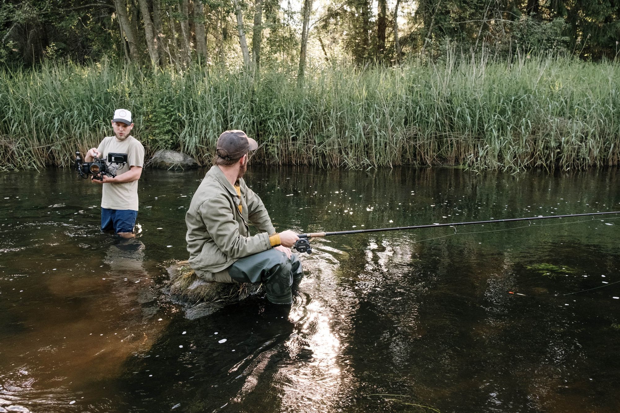 filming guy fishing