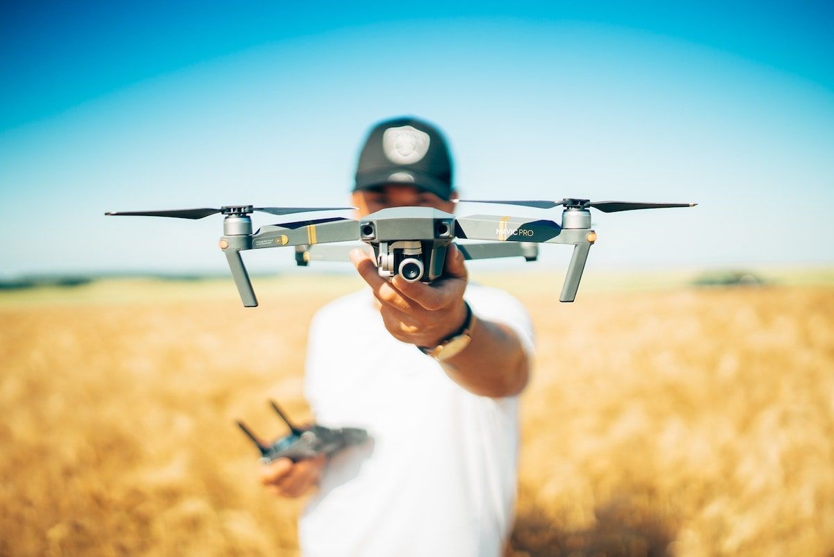 man holding a drone