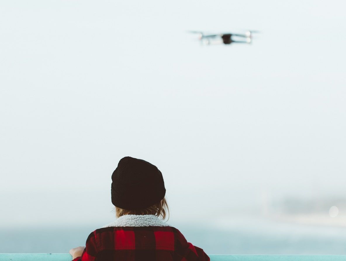 woman flying a drone