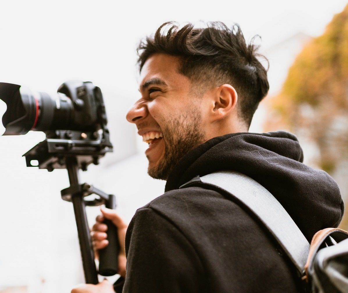 photographer smiling monopod