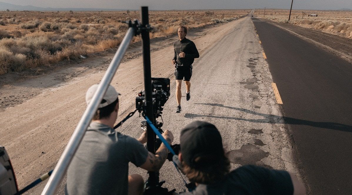 running man getting filmed