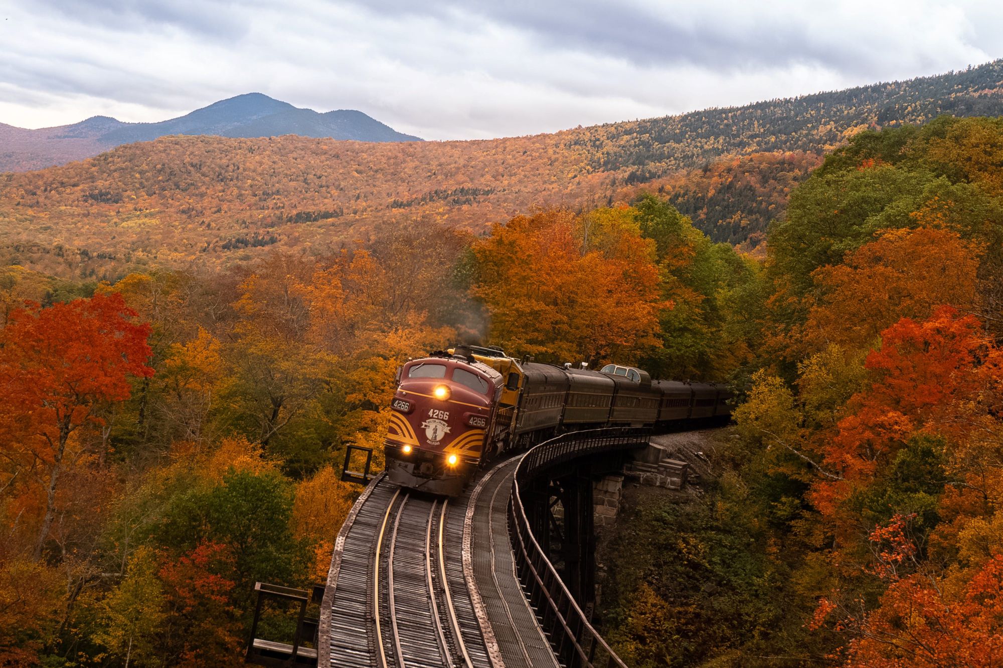 Train in the mountains shot from a dutch angle