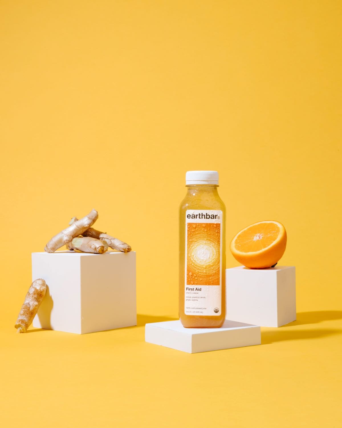 product photography juice orange juice and ginger