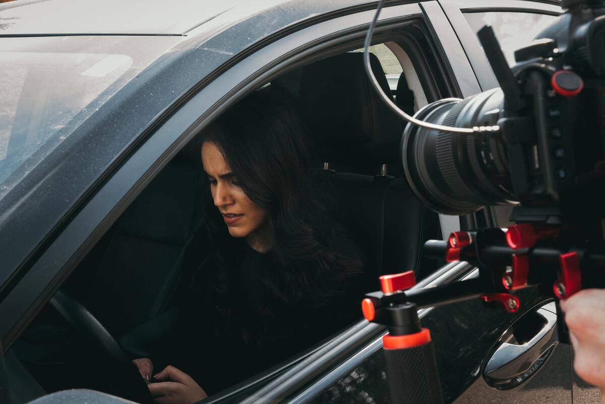 female producer filming New York